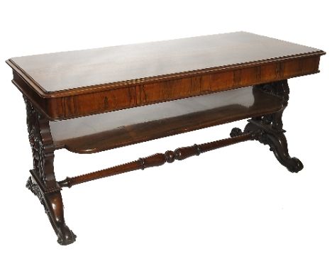 A 19th century rosewood centre or library table, fitted two frieze drawers with pierced end supports, on four scroll feet, wi