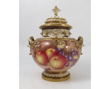 A Royal Worcester covered bow vase, hand painted with fruit to a mossy background by Freeman, with pierced neck, gilt handles