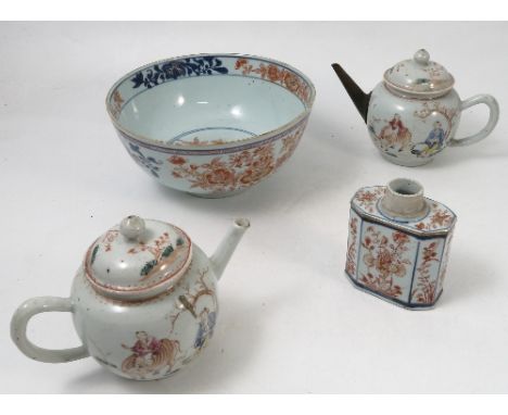 Two 19th century Oriental bullet shaped tea pots, decorated with figures in landscape, one with metal spout, together with a 