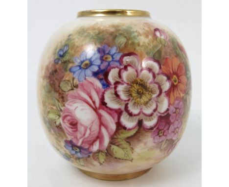 A Royal Worcester vase, decorated to the front with flowers by Freeman, shape number 2491, dated 1952, height 3ins Condition 