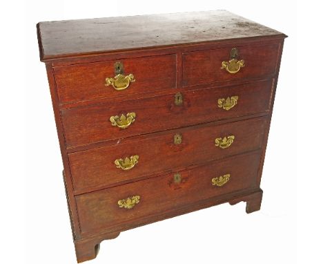 A Georgian mahogany straight front chest, of two short drawers over three long drawers, raised on bracket feet, width 39ins