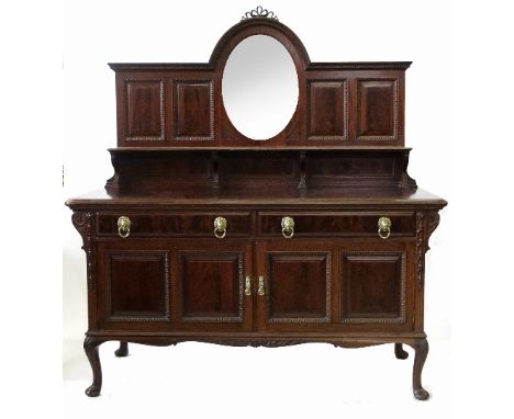 A mahogany mirror back sideboard, the shaped back with central mirror flanked by panels with shelf below, the base fitted wit