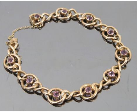 An Edwardian amethyst set bracelet, stamped D&F for Deakin and Francis, and '9ct' to the box clasp, weight 14.5g gross 
