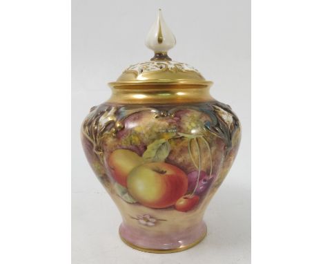 A Royal Worcester covered vase, the quarter lobbed body hand painted with fruit to a mossy background by Stanley, with pierce