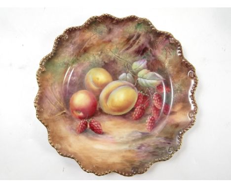 A Royal Worcester cabinet plate, hand painted with fruit to a mossy background by H H Price, diameter 9ins Condition report: 