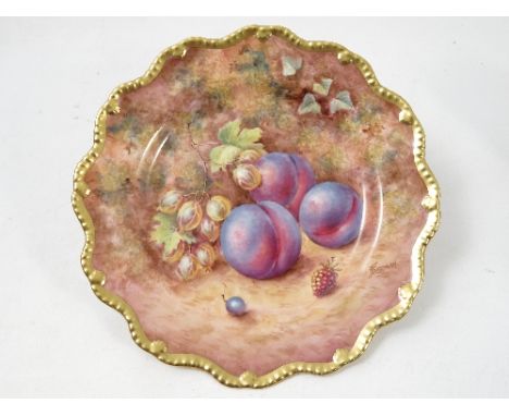 A Royal Worcester cabinet plate, hand painted with fruit to a mossy background by Freeman, diameter 8.75ins Condition report: