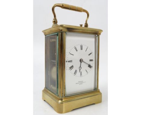 A brass repeating carriage clock, the enamel rectangular dial with Roman numerals and marked Webster Queen Victoria Street Lo