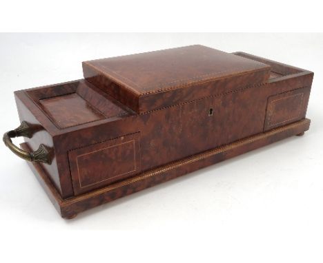 A mahogany and burr wood smoker's box, of rectangular form, the central box flanked by two recessed trays, the lid opening to