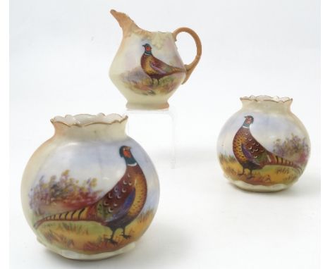 Three pieces of Locke and Co Worcester blush ivory, a pair of vases decorated with pheasants by Morris, height 2.75ins and a 