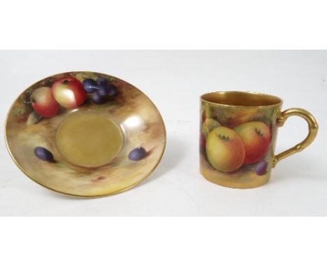 A Royal Worcester coffee can and saucer, hand painted with fruit to a mossy background by Shuck and Bee, dated 1929/30 Condit