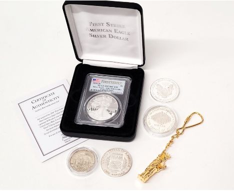 A small collection of American commemorative coinage, comprising two Westminster One and Half-Dollar Coins, commemorating the