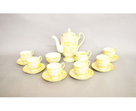 An Art Deco Collingwoods six place coffee set, with transfer printed floral decoration heightened in gilt and green painted s