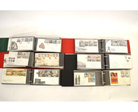 Six albums of First Day Covers, each album containing a good quantity of FDCs together with eight empty stamp albums.