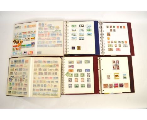 Fifteen stamp albums containing mostly Commonwealth stamps, countries include St Kitts &amp; Nevis, Nauru, Antigua, Australia