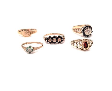 Five 9ct gold rings, including two sapphire and diamond cluster examples, ring size N, a garnet heart decorated signet ring, 