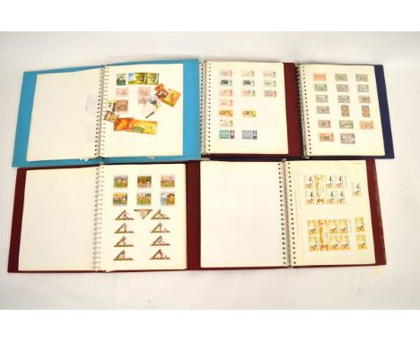 Seventeen stamp albums containing mostly Commonwealth stamps, countries include Nigeria, Newfoundland, British Colombia, Sout