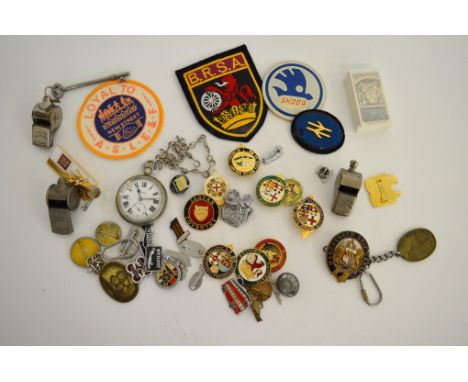 A collection of Railwayana and motor and transport badges, whistles etc, including an LMS open faced Vertex pocket watch and 