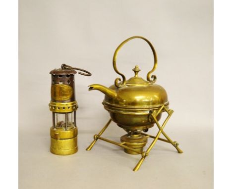 A Thomas &amp; Williams Ltd Midget Miner's Lamp, The brass and steel lamp of tapered form, safety glass to centre with label 