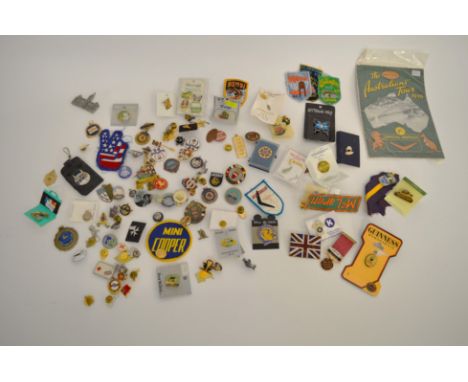 A collection of miscellaneous base metal and enamel badges, and buttons including various New Zealand tourist cloth badges an