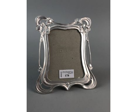 ART NOUVEAU STYLE WHITE METAL PHOTOGRAPH FRAME, along with a small plated ash dish and an Art Nouveau style ceramic jardinier