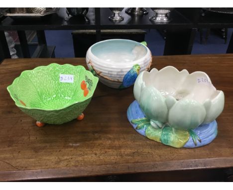 CLARICE CLIFF BOWL, decrorated with budgerigars, 21cm diameter, along with another Clarice Cliff bowl and a Beswick bowl (3)