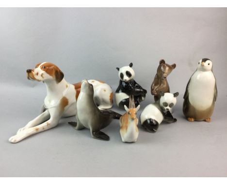 RUSSIAN CERAMIC MODEL OF A DOG, 29cm long, along with six other Russian ceramic animals (7)