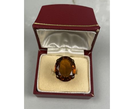 A 9CT GOLD RING SET WITH A CITRINEWeight: 8.4gms
