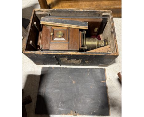 AN ANTIQUE MAGIC LANTERN IN ORIGINAL WOODEN CRATE