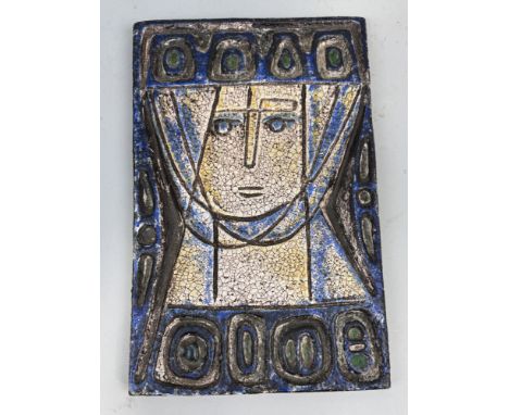V A MID-CENTURY MODERN CERAMIC PLAQUE DEPICTING A FEMALE PORTRAITLava glazed.Signed and dated 1966.41cm x 27cm