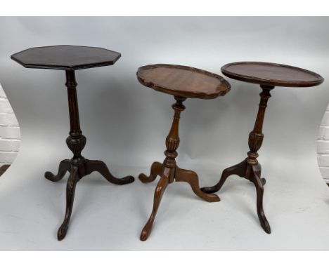 A GROUP OF THREE TRIPOD TABLESTallest 54cm H