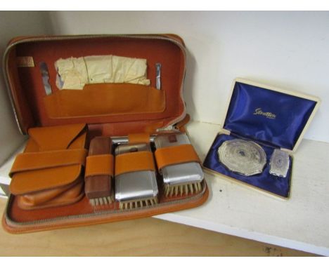 A Strattons boxed compact and finger mirror and a gents vanity case 