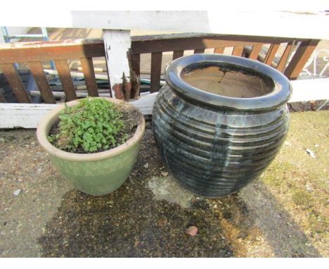 2 ceramic garden plant pots. Largest H39cm approx
