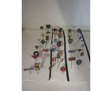 Vintage motoring  related pin badges- around 40 to include Esso, Caltex, Ford, chevrolet, Pam etc