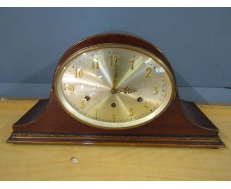 Kenzle mantel clock with oval face, German movement, westminster chimes. 