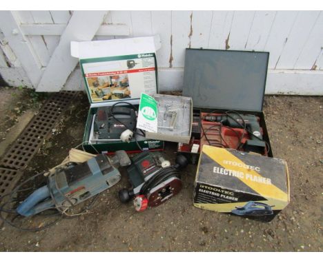 Power tools from a house clearance with plugs removed 