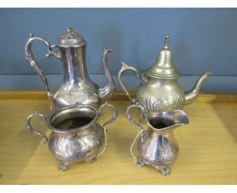 A plated tea pot, jug and bowl set and one other teapot