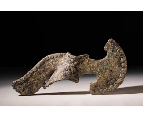 Ca. 1200 - 800 BC. A Western Asiatic bronze axe-head with an imposing blade extending from a lengthy neck with a down-swept b