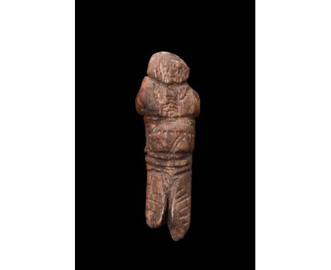 Eastern Viking, Ca. AD 600 - 900. A wooden anthropomorphic idol crafted with simplified features. They were used as objects o