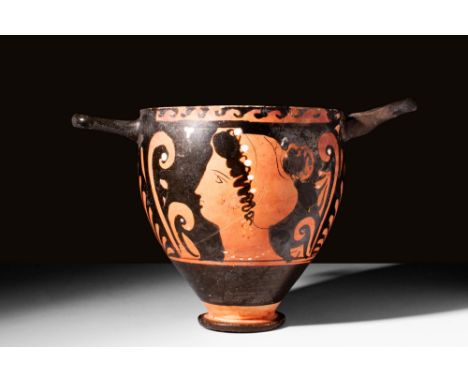 Ca. 350 - 300 BC. A red figure Apulian skyphos. On Side A and Side B there is a lady of fashion with a necklace and a diadem 