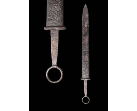 Ca. AD 100. A double-edged blade with a short straight handle and a ring eyelet. This blade is a product of the Roman Sarmath