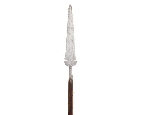 **A PARTISAN, LATE 16TH/EARLY 17TH CENTURY, FRENCH OR ITALIAN with tapering blade of flattened-diamond section, etched with a