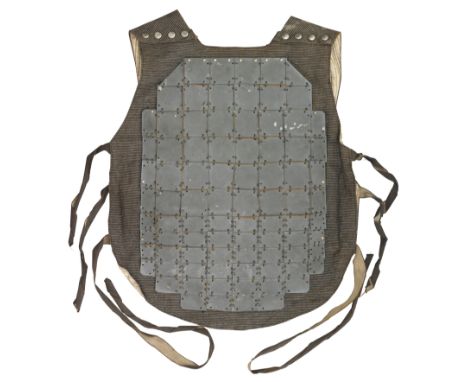 A 'FRANCO-BRITISH CUIRASS', CIRCA 1916-17 formed of a front and a rear section each fitted externally with small green-enamel