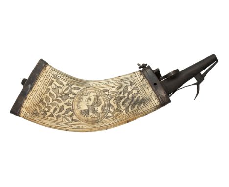 A GERMAN ENGRAVED COWHORN POWDER-FLASK, EARLY 17TH CENTURY with curved flattened body, the inner face engraved with a pattern