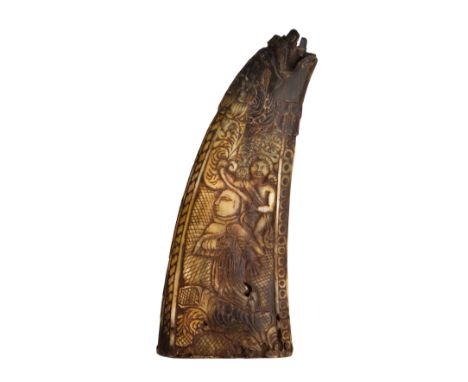 A HORN FLASK, LATE 17TH CENTURY with curved body of flattened polished cowhorn, the spout formed as a monstrous mask (chipped