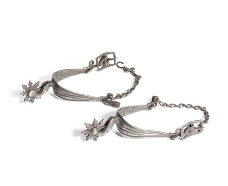 A PAIR OF EUROPEAN ROWEL SPURS, EARLY 18TH CENTURY each of iron, with flat longitudinally-ribbed sides that deepen towards th
