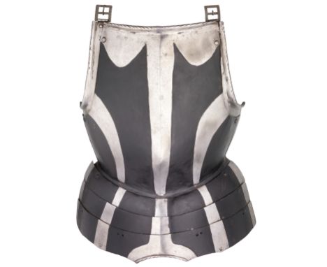 A GERMAN 'BLACK AND WHITE' BREASTPLATE, CIRCA 1580 formed of a medially-ridged main plate projecting forward over the belly, 