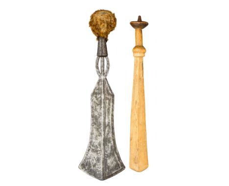 TWO AFRICAN SHORTSWORDS, LATE 19TH/20TH CENTURY the first for the Poto, Doko or Ngombe tribe, with broad blade flaring at the