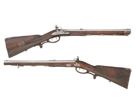 A PAIR OF 20 BORE SOUTH GERMAN FLINTLOCK RIFLED SPORTING CARBINES BY WOLF, MERSPARG, CIRCA 1730 with octagonal sighted barrel