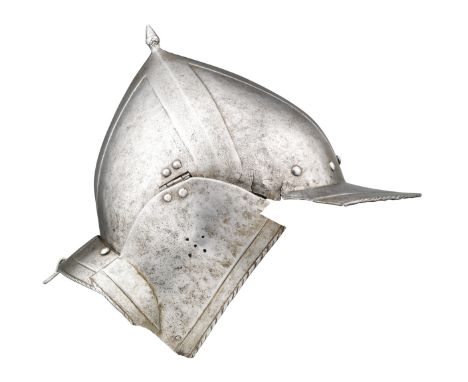 A GERMAN BURGONET WITH EMBOSSED DECORATION IN THE 'BLACK AND WHITE' FASHION, THIRD QUARTER OF THE 16TH CENTURY with pointed o