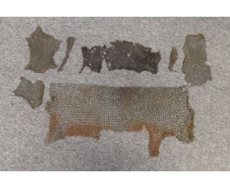 **A LARGE FRAGMENT OF MAIL, PROBABLY MIDDLE EASTERN, 18TH CENTURY; ANOTHER SIMILAR, PROBABLY MIDDLE EASTERN, 19TH CENTURY; AN